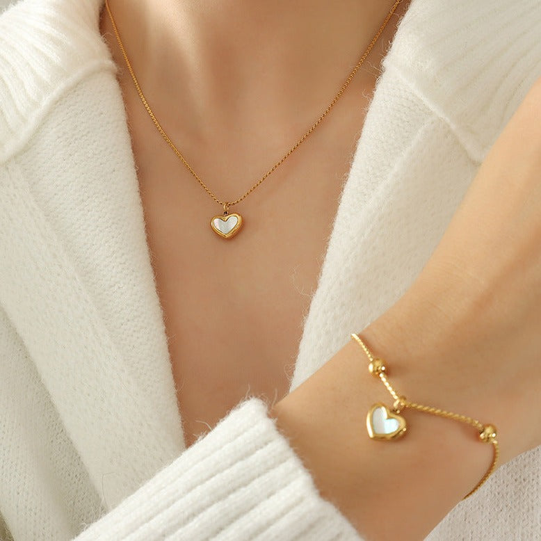 Amora - Verstelbare gouden armband met hartje hanger
