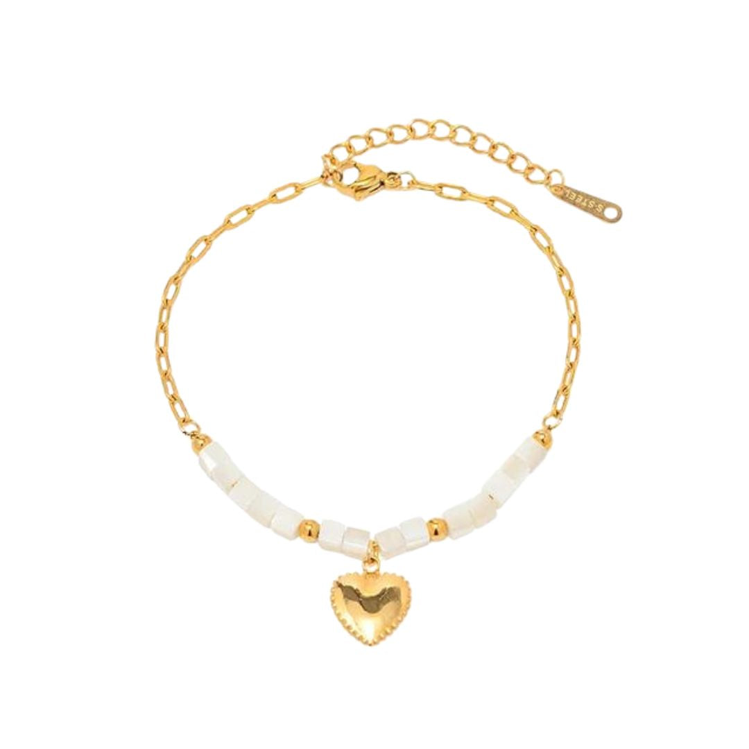 Adrienne - Elegante armband met gouden accenten en natuurlijke schelp