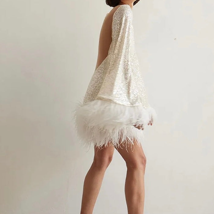 Ariella - Glamoureuze jurk met pailletten en zoom met veren